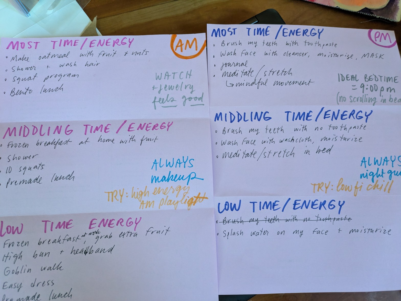 two sheets of purple paper with collourful writing on them detailing my morning and evening routines